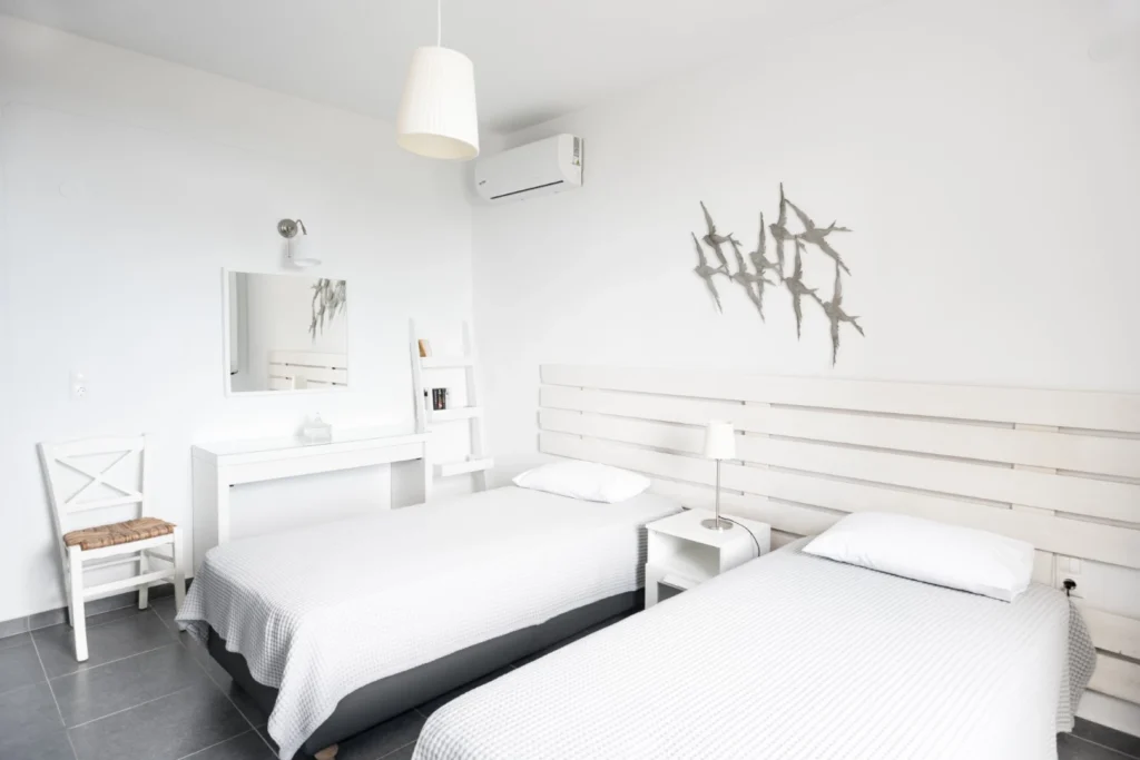 Bedroom with twin beds at Aegean Breeze Villa