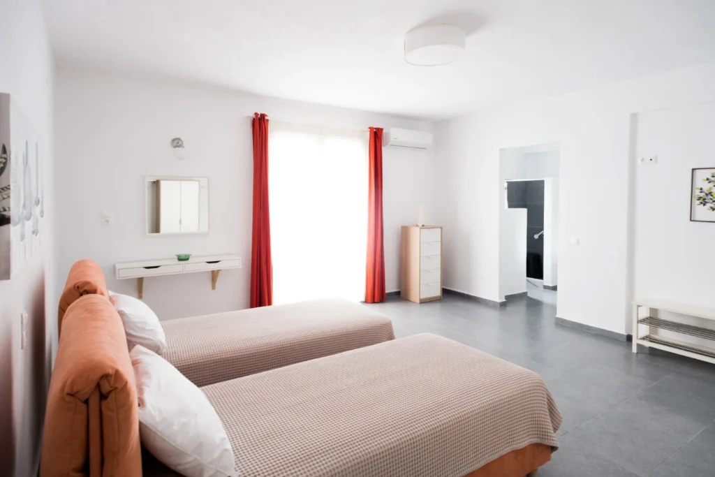 Guest bedroom with twin beds at Aegean Breeze Villa