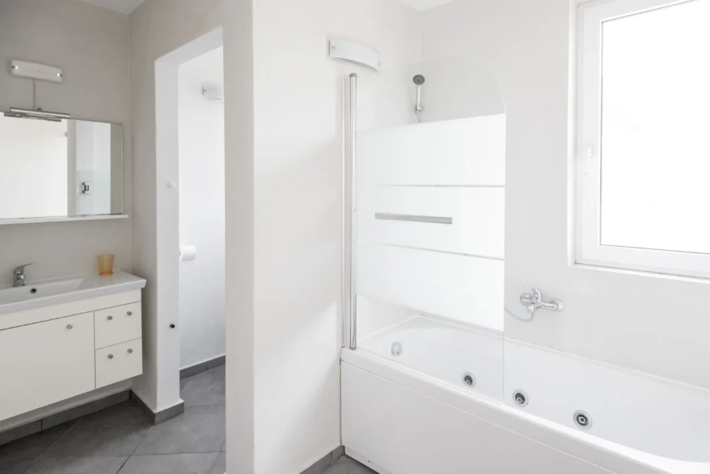 Bathroom with natural light and calm atmosphere at Aegean Breeze Villa