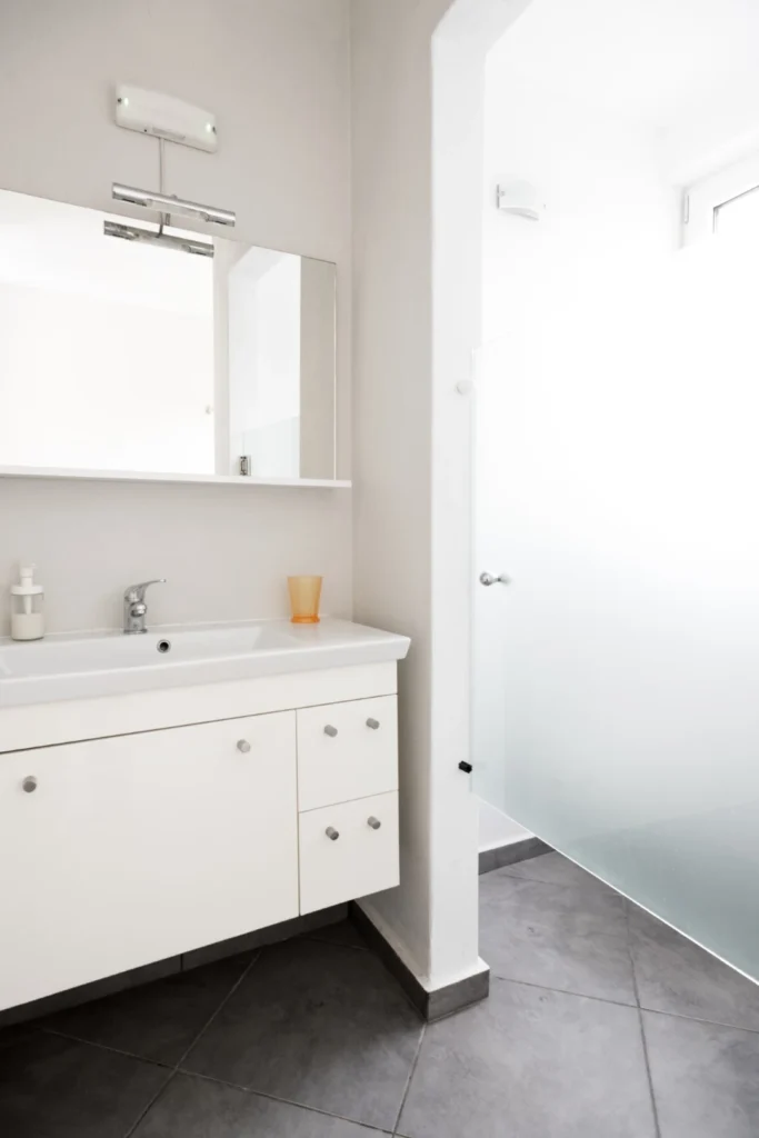 Bathroom with natural light and calm atmosphere at Aegean Breeze Villa