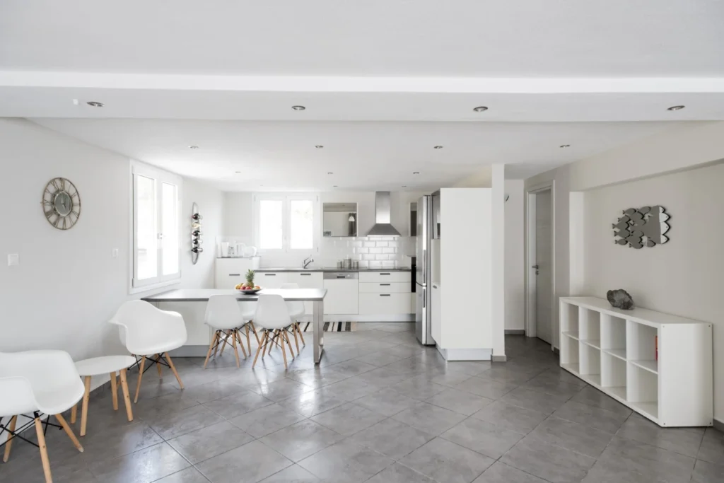 Bright kitchen with dining area in a private villa in Skiathos