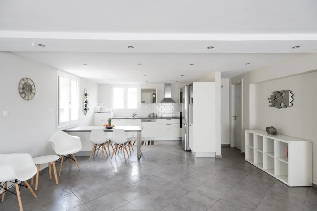Bright kitchen with dining area in a private villa in Skiathos