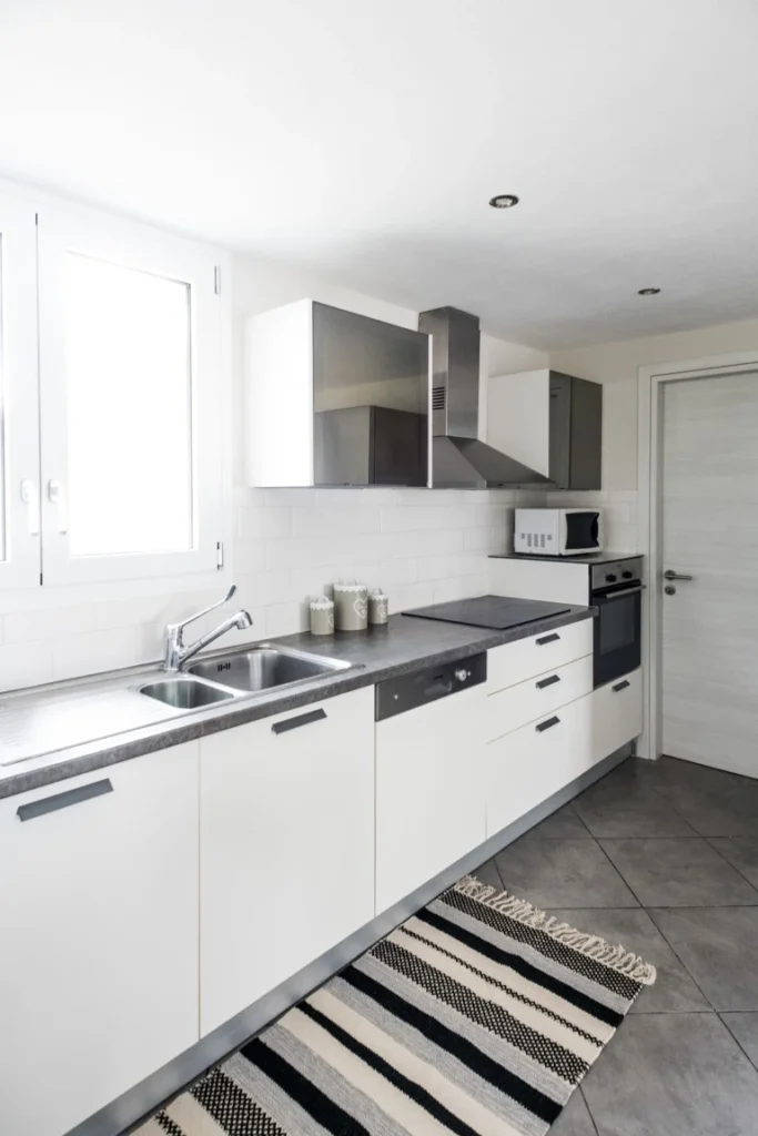 Minimal kitchen design with natural light at Aegean Breeze Villa