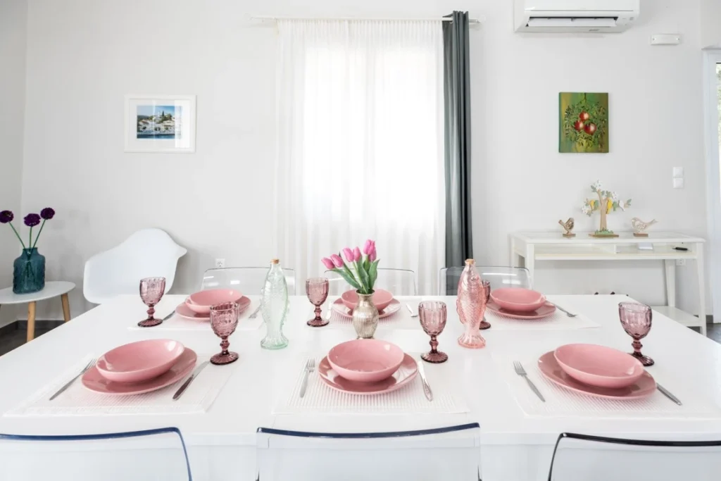 Dining area in the open space living room in Aegean breeze Skiathos Villa