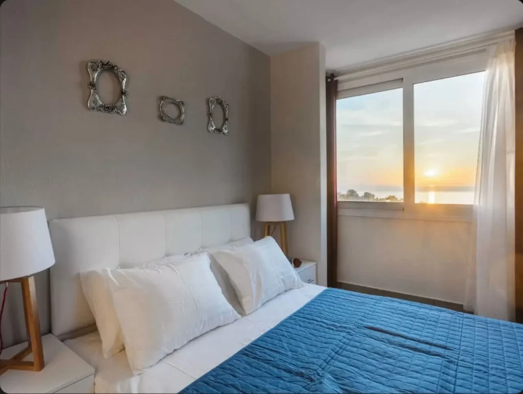 Spacious living area with natural light at Aegean Breeze Villa