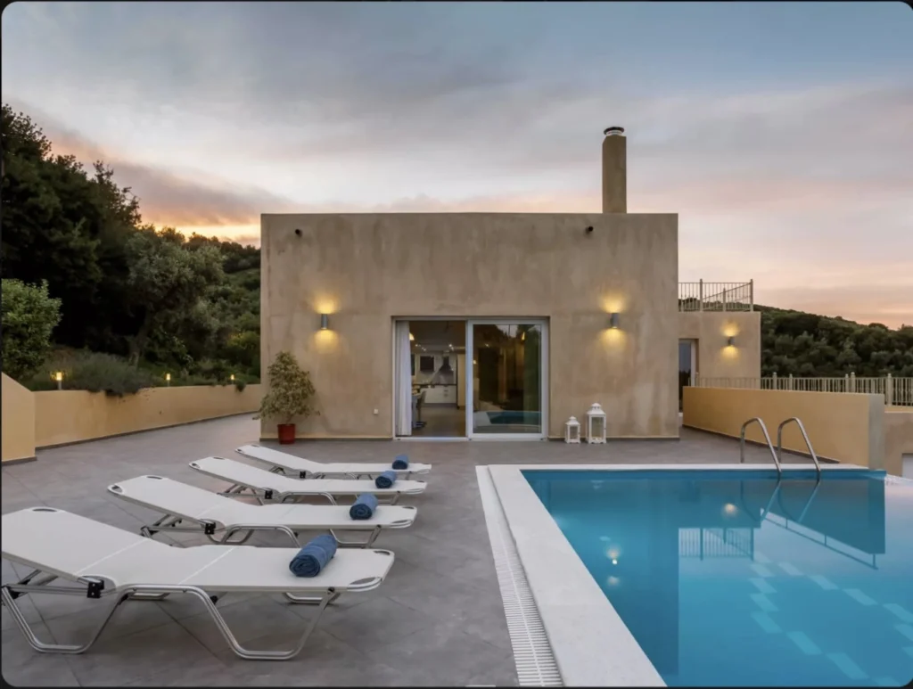 Sunset view with Private swimming pool with sea view at Aegean Breeze Villa in Skiathos